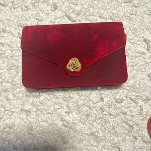 Chic Red Velvet Clutch with Gold Knot